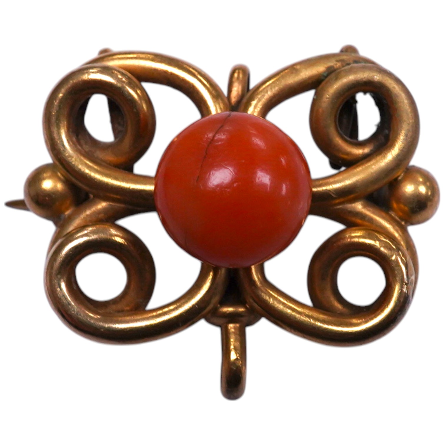 A yellow metal and coral bead set scrolling brooch, 31mm, gross weight 13 grams. Condition - poor